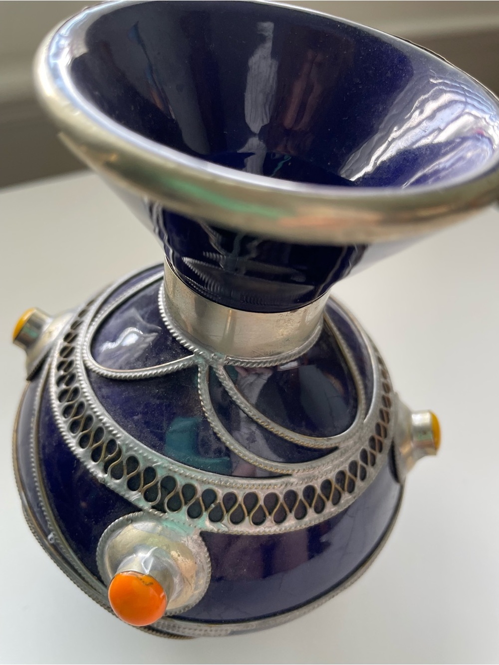 Vase and small teapot in cobalt blue enameled ceramic.